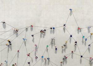 Crowd from above forming a growth graph